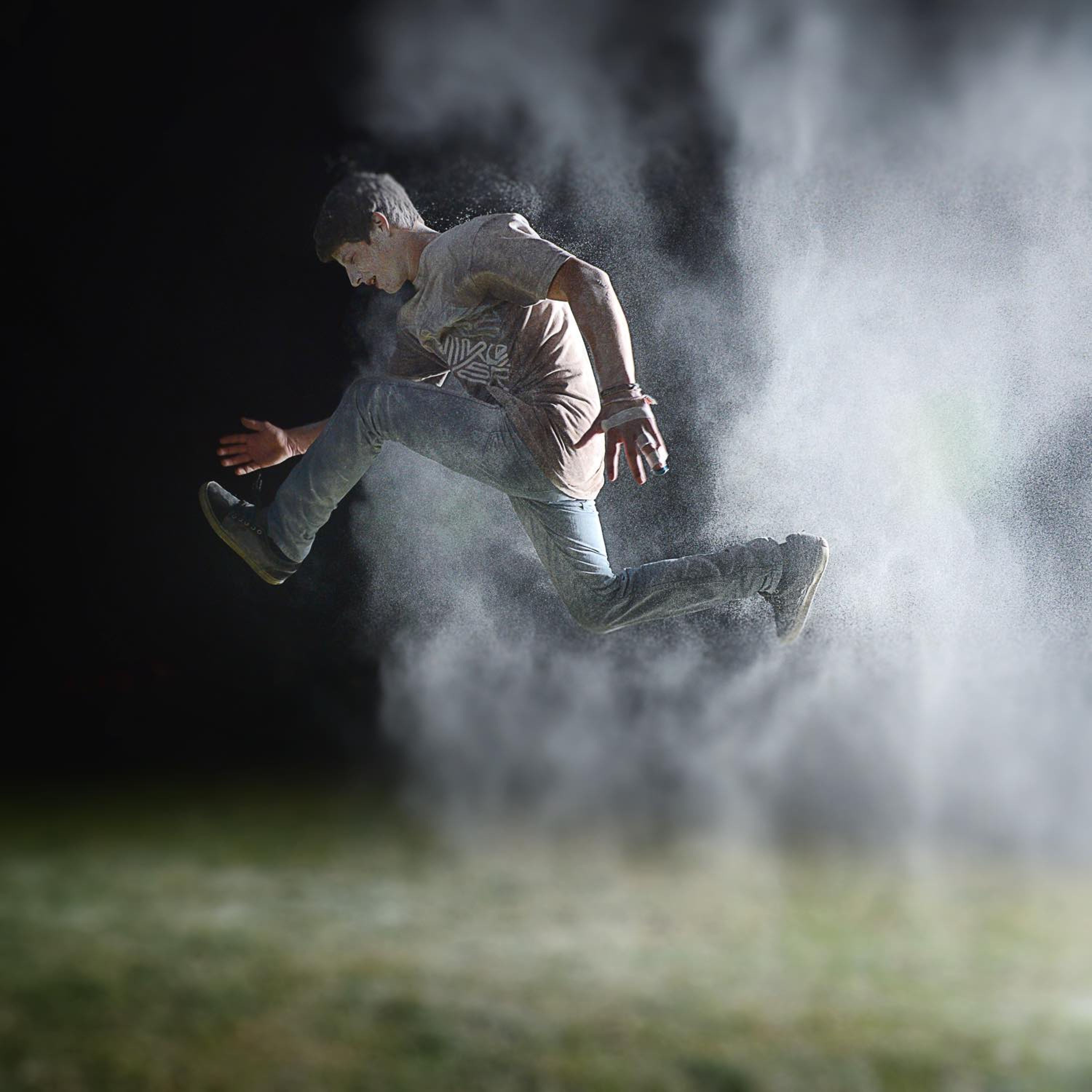 Image of boy jumping in the air.