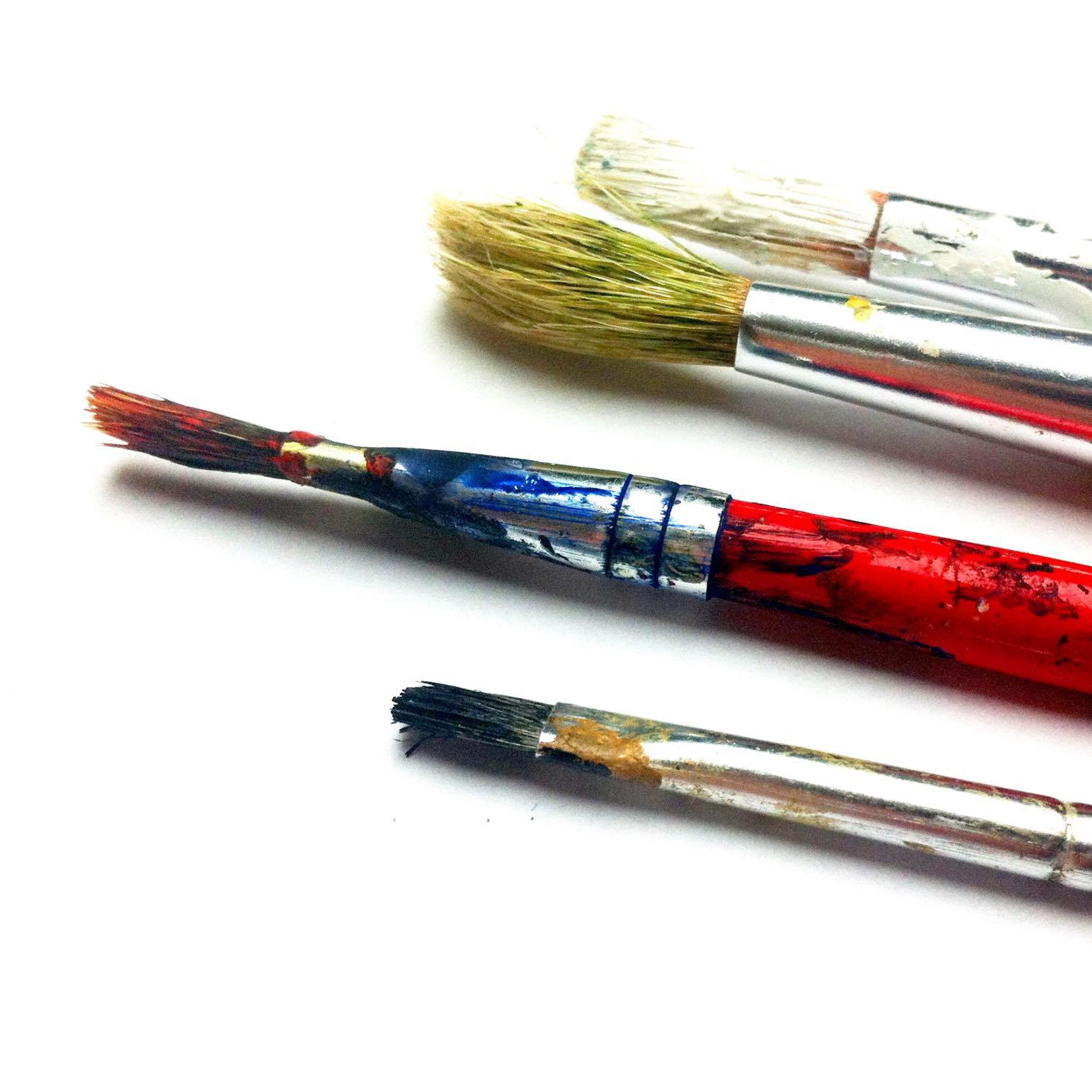 Image of paint brushes laying flat.