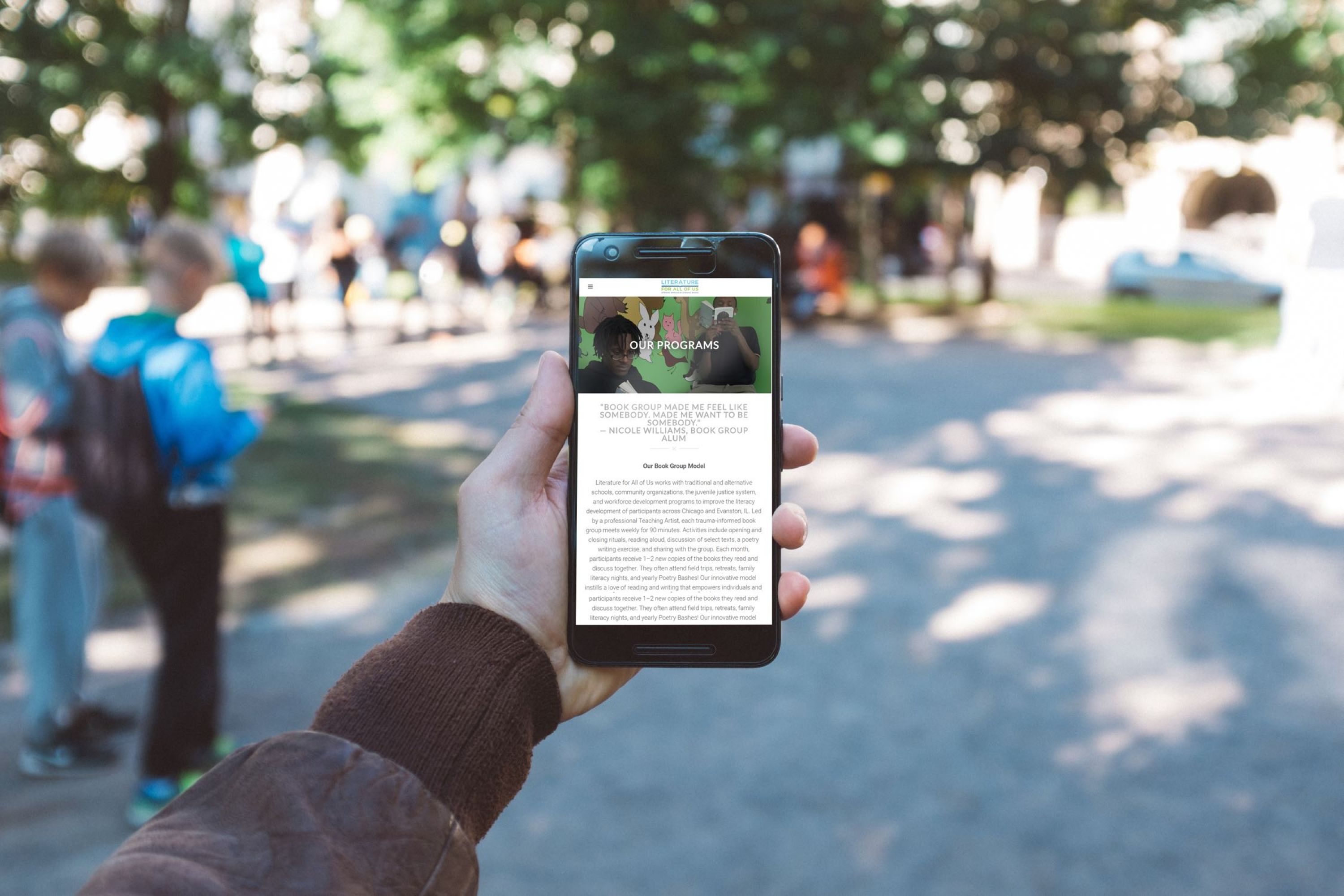 Image of hand holding a phone.