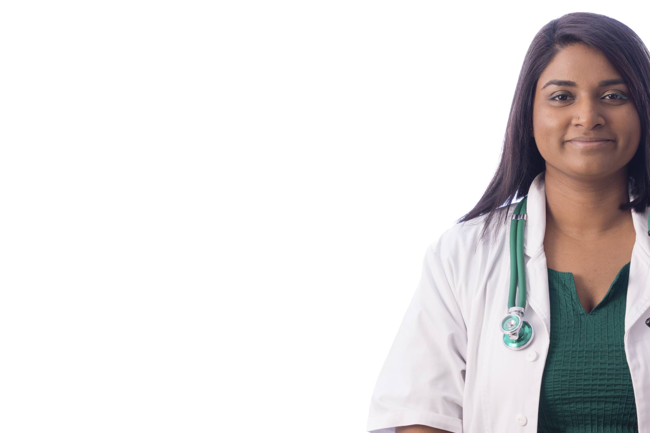 Image of a smiling woman in a lab coat.