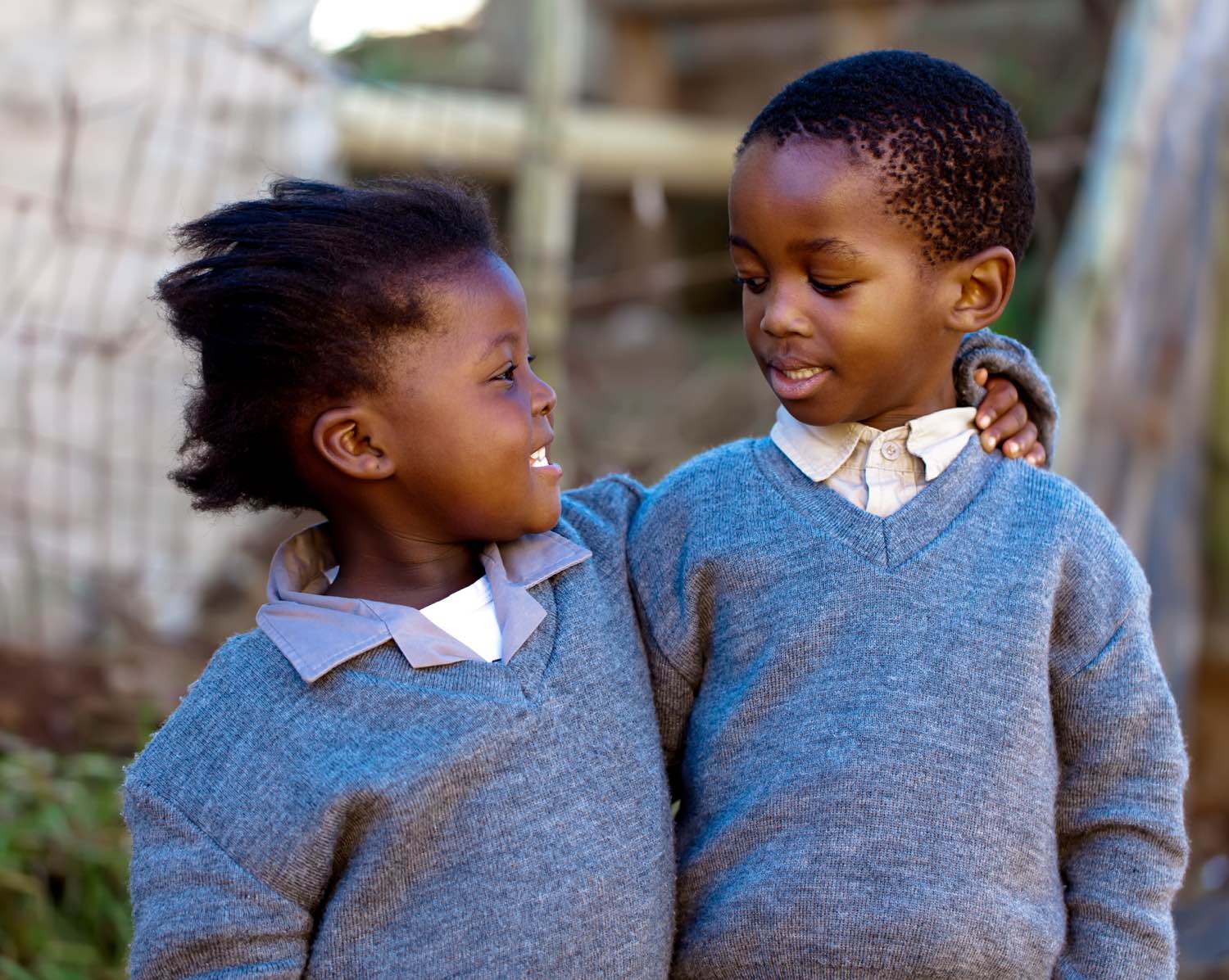 Image of two children hugging.