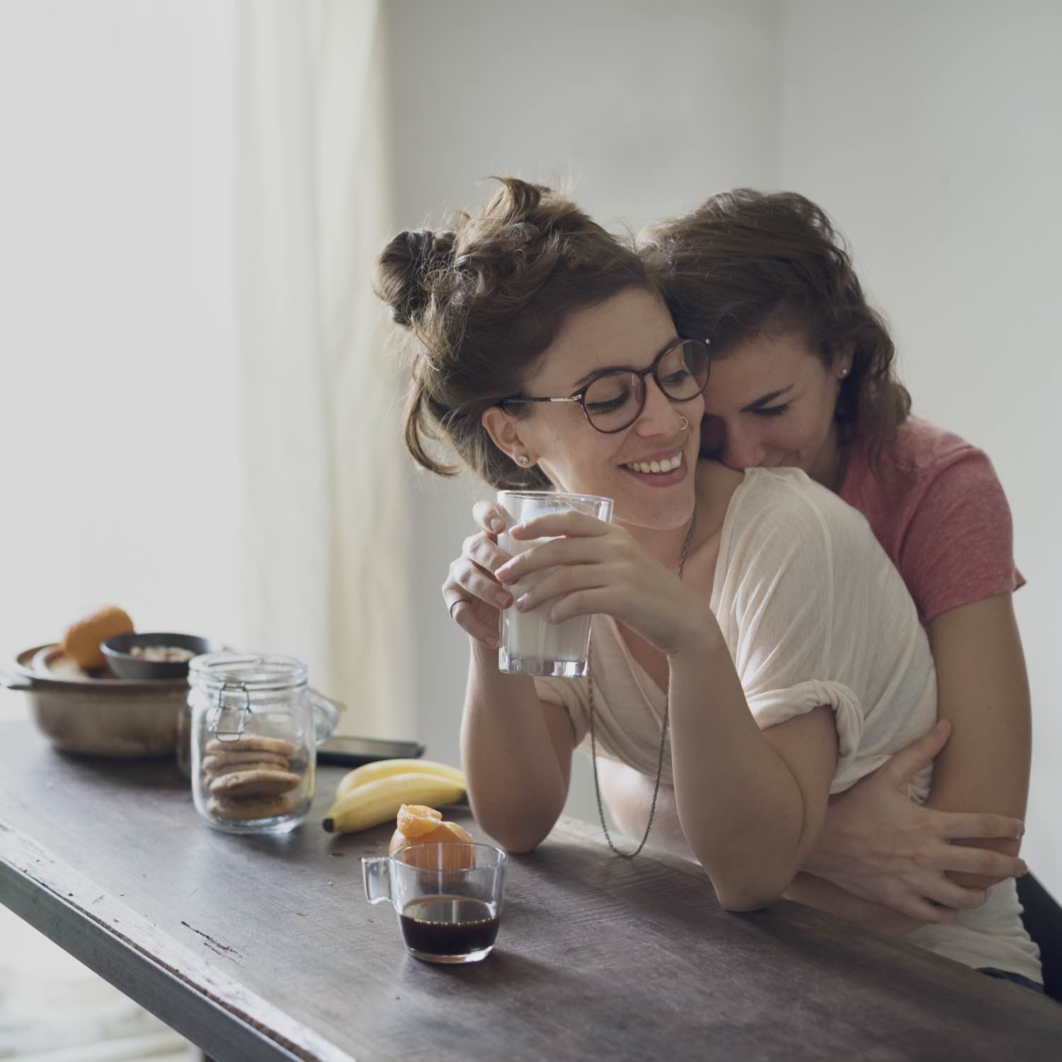 Image of two women hugging.